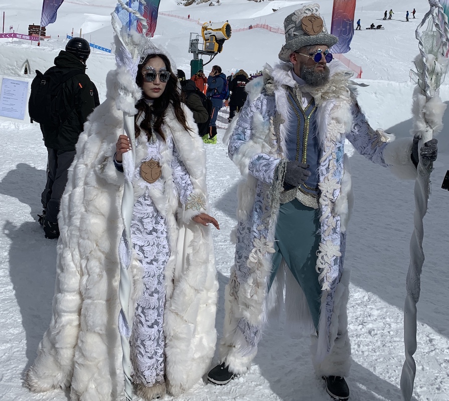 Tomorrowland Winter couple in Bright outfit